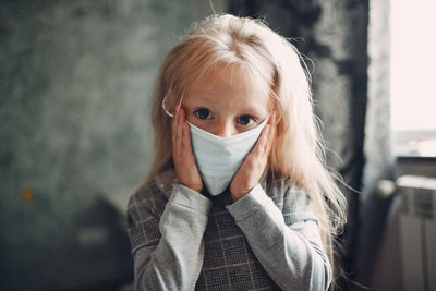 Portrait of girl wearing mask