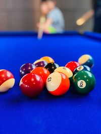 Close-up of multi colored balls on table