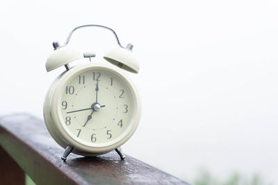 Close-up of clock on wall