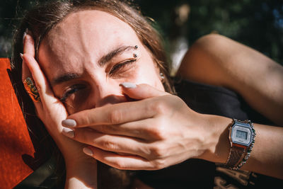 Close-up of woman laughing 