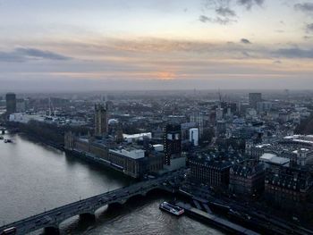 High angle view of river amidst buildings in city