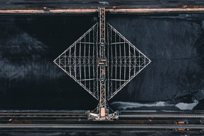 Aerial view of bridge over river against sky