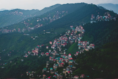 High angle view of townscape against mountains