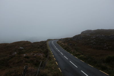 Road on mountain against clear sky