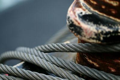 Close-up of rope tied on wooden post