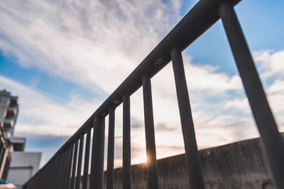 Low angle view of bridge against sky during sunset