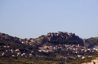 Townscape against clear sky