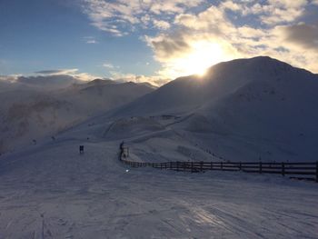 Scenic view of mountains against sky during winter