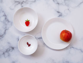 High angle view of fruits in bowl on table