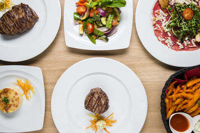 High angle view of food served on table