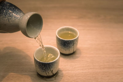 Close-up of tea cup on table