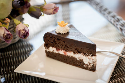 Close-up of cake served on table