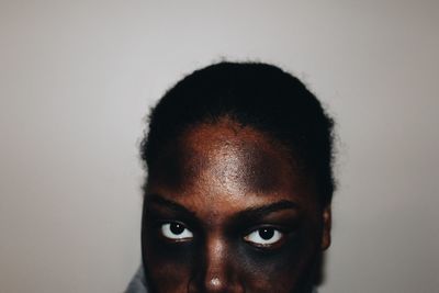 Close-up of young woman wearing face paint