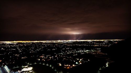 Illuminated cityscape at night