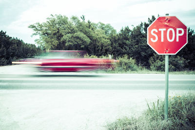 Blurred motion of truck moving on road