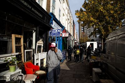 People walking on street in city