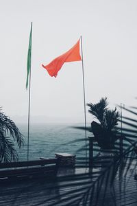 Close-up of flag against sky