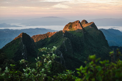 Scenic view of mountains against sky during sunset