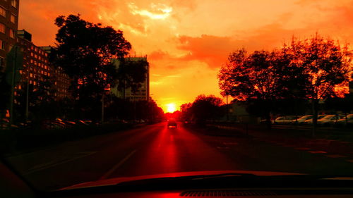 Sunset seen through car windshield