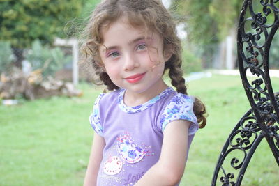 Portrait of cute girl smiling in park