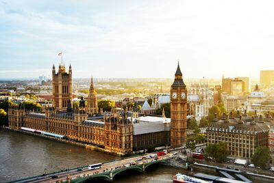 High angle view of westminster bridge by big ben against sky