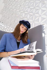 Young woman in the library with books