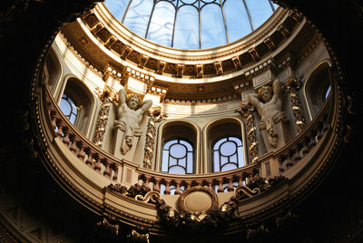 Low angle view of ornate building against sky