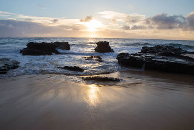 Scenic view of sea against sky during sunset