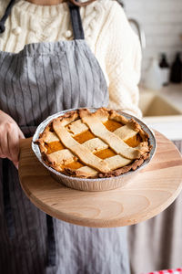 Happy thanksgiving day. autumn feast. woman celebrating holiday cooking traditional dinner at kitche