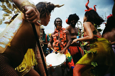 Group of people playing guitar