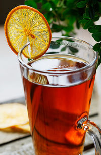 Close-up of tea glass in glass on table