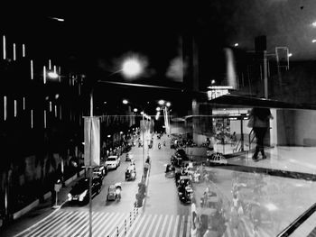 People walking on road at night