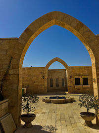 Archway against clear sky