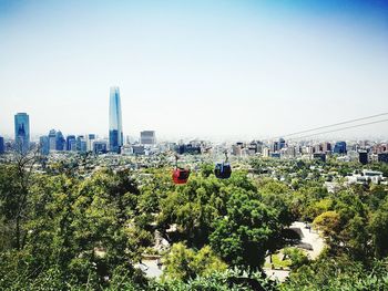 View of cityscape against clear sky