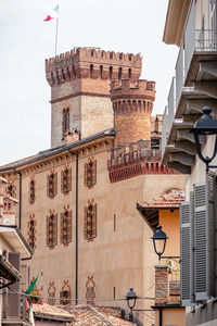 Medieval castle and narrow street of barolo, piemonte, langhe wine district and unesco heritage