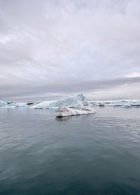 Scenic view of frozen sea against sky