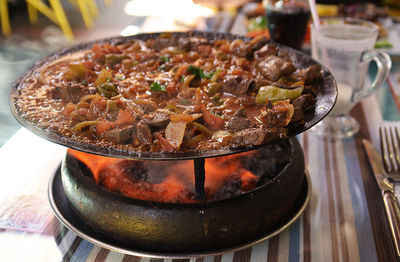 Close-up of food on stove at restaurant