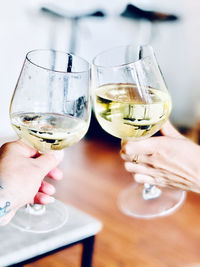 Close-up of hand holding wineglass