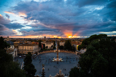 High angle view of buildings against sky during sunset