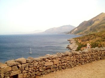 Scenic view of sea against clear sky