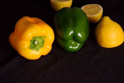 Close-up of yellow bell peppers on table