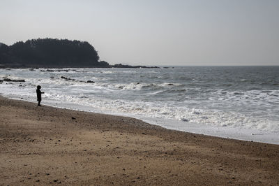 Scenic view of sea against clear sky