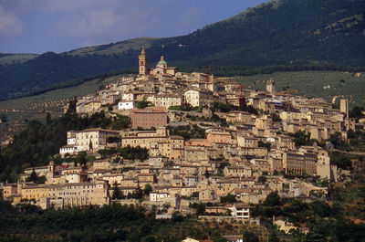 Trevi by mountain against sky