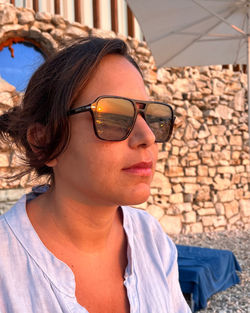 Portrait of young woman wearing sunglasses