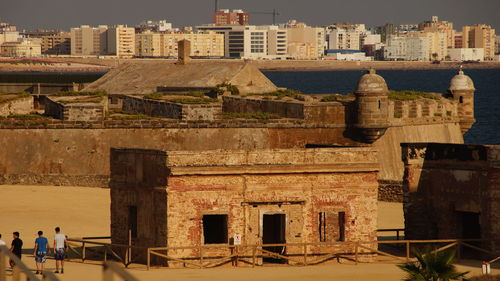 Tourists in front of historic building