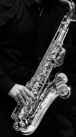 Close-up of musician playing musical equipment