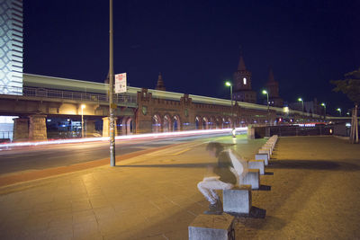 Light trails on road in city at night