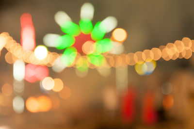 Defocused image of illuminated lights at night