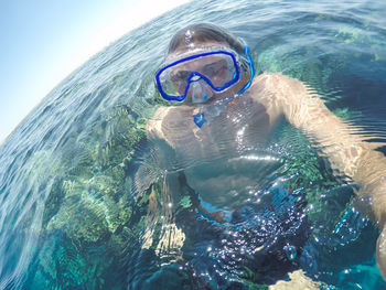 Man snorkeling in sea