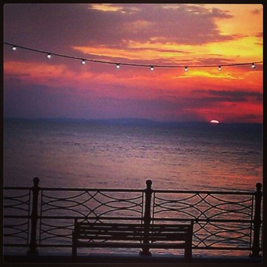 sunset, sea, horizon over water, orange color, water, scenics, sky, beauty in nature, tranquil scene, tranquility, transfer print, nature, idyllic, railing, auto post production filter, cloud - sky, silhouette, cloud, sun, dramatic sky